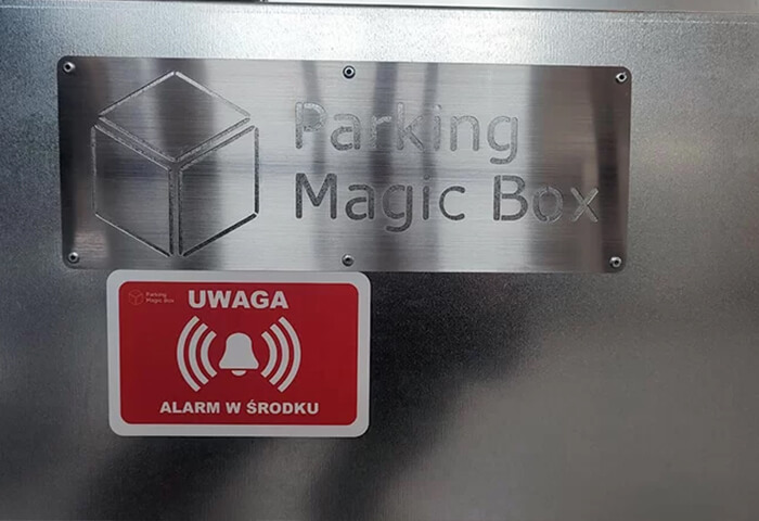 Naklejka: Uwaga Alarm w środku